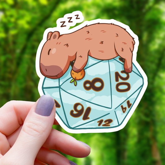 Capybara Sleeping on Polyhedral D20 Sticker- 3"